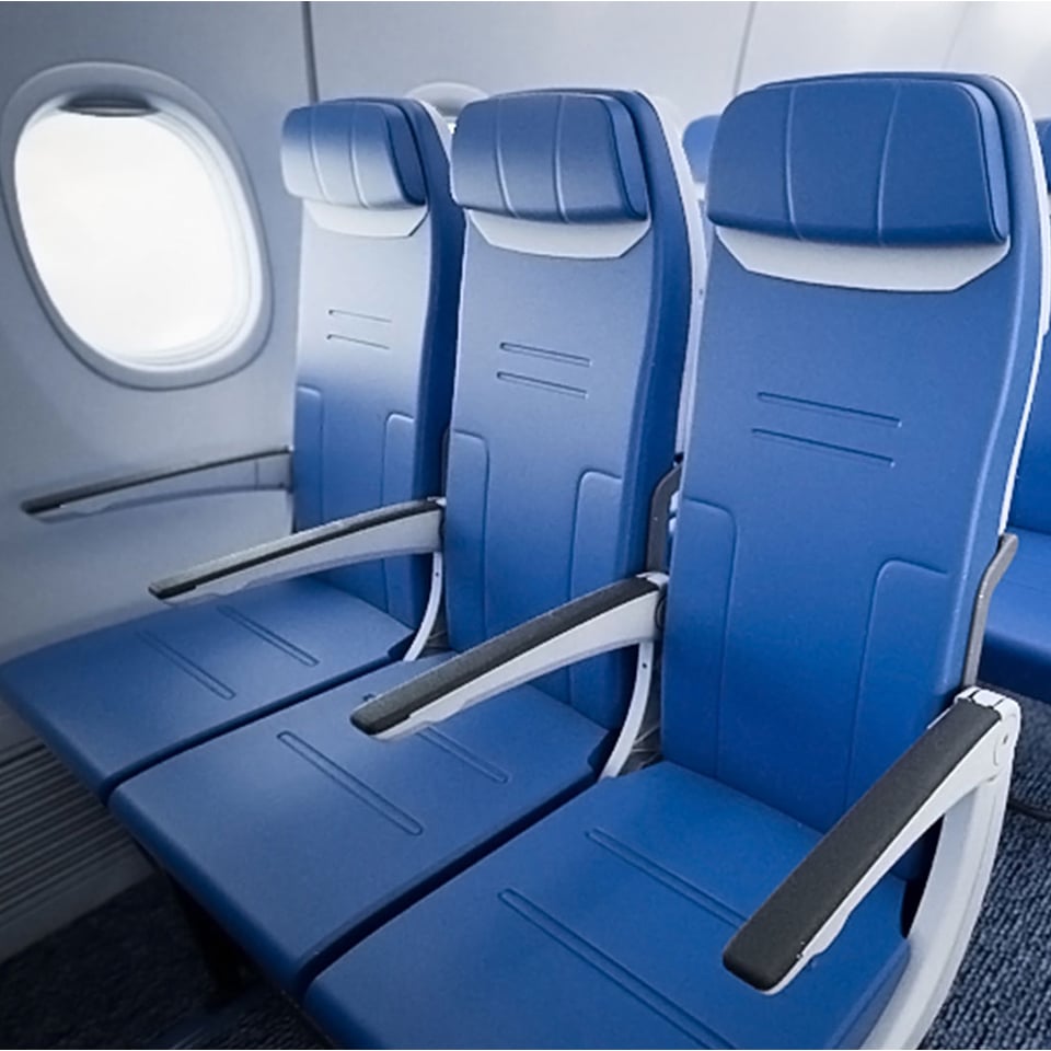 A photorealistic 3D rendering of the interior of a Southwest Airlines aircraft