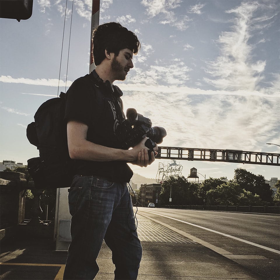 Isaac Murray with video equipment