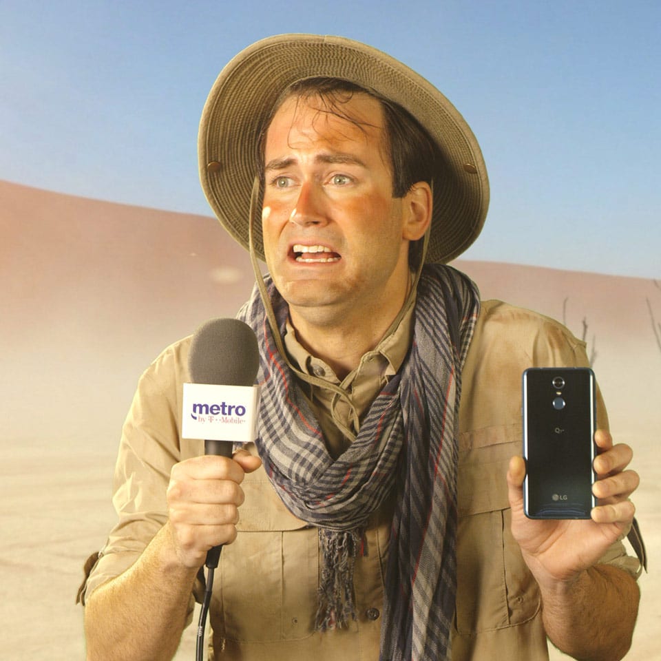 A green screen composite of a news anchor stranded in the desert for a wireless company commercial