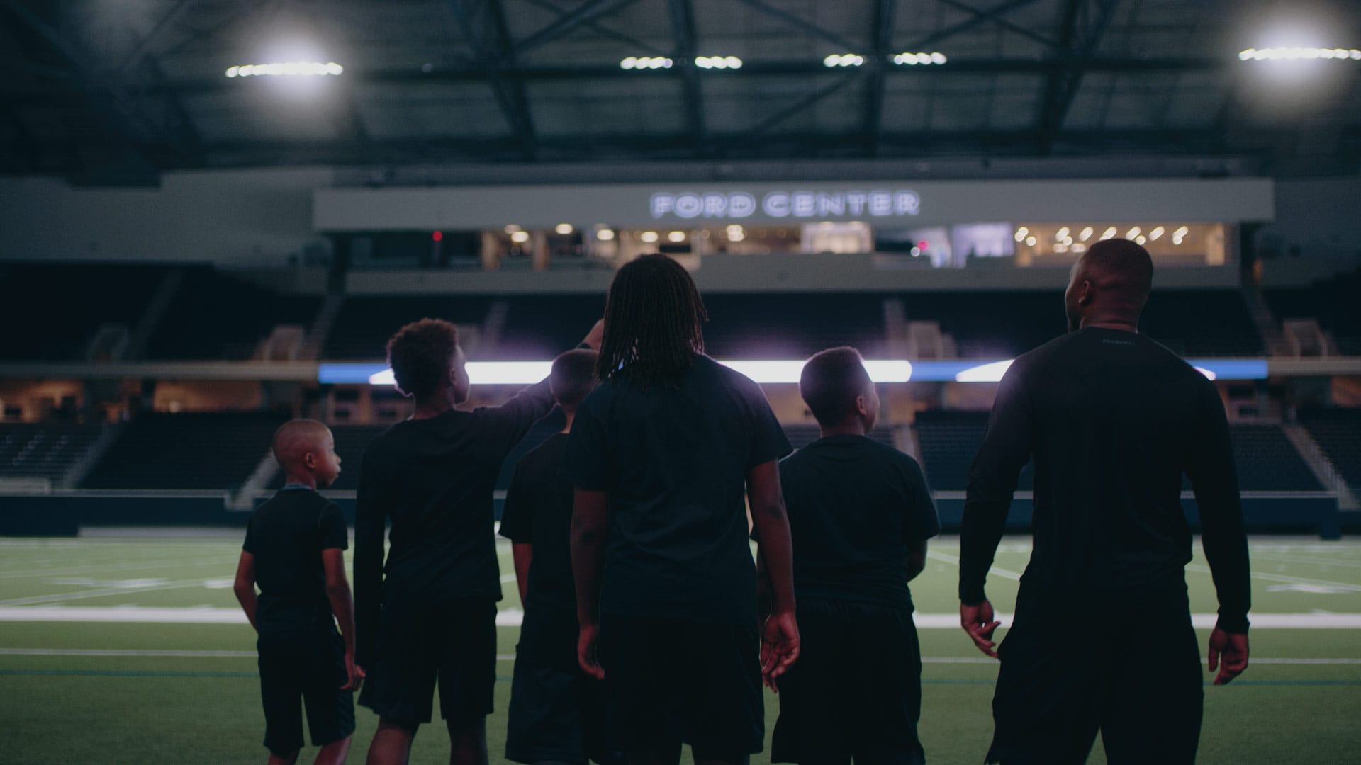 A shot of a football stadium from a branded documentary style video