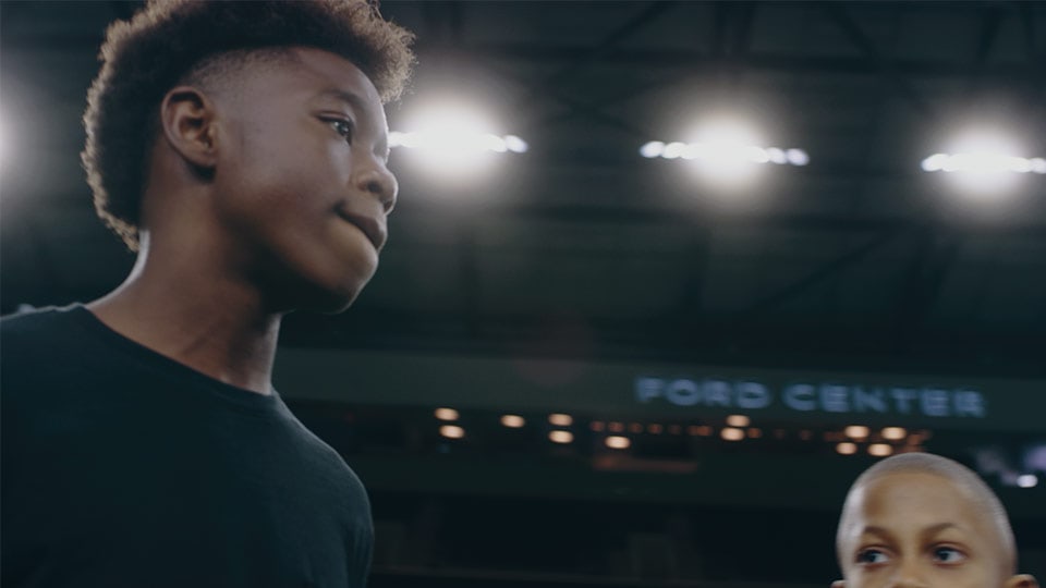 A shot of a football player from a branded documentary style video